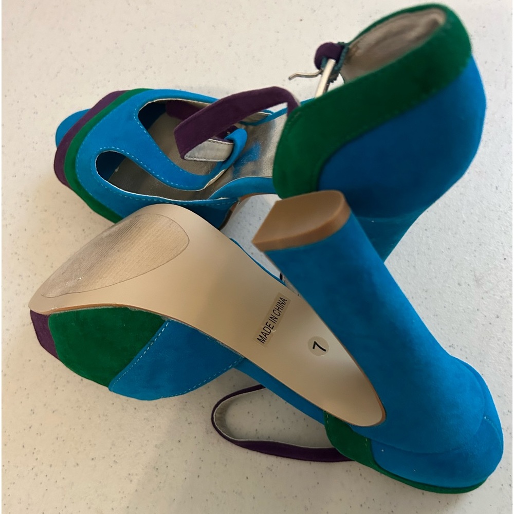 Women toes out platform heels multi colored.